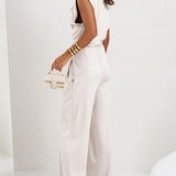 Brigitte - Ebakorrapärase ülaosa ja laiade pükste komplekt