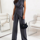 Brigitte - Ebakorrapärase ülaosa ja laiade pükste komplekt