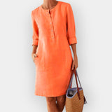 Elegantse lihtsusega puuvillane midi kleit