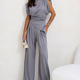 Brigitte - Ebakorrapärase ülaosa ja laiade pükste komplekt