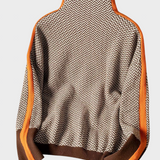 Aili - Kõrge kaelusega kampsun erksate kontrastsete triipudega