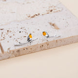 Koomiks Tier Vogel Kõrvarõngad